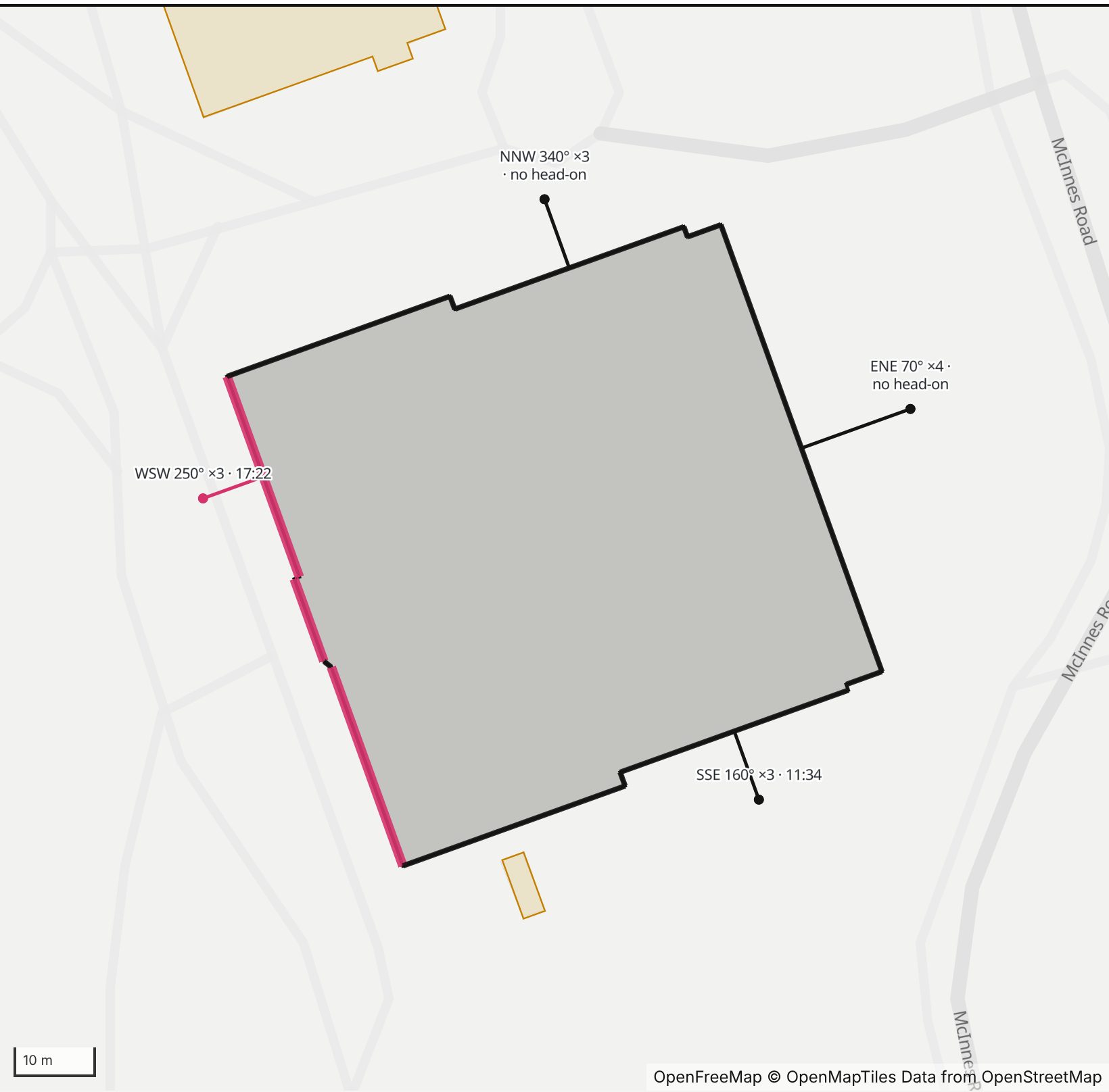 Map of the DiMenna-Nyselius Library at Fairfield University in Henge Days, with its west-southwest front highlighted in pink and every wall labeled with its bearing.