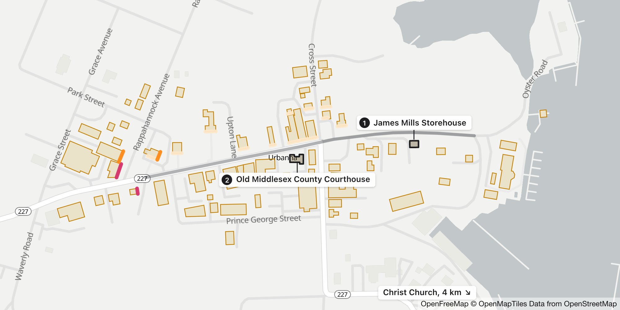 Map of Urbanna, Virginia, from the west end of Old Virginia Street to the waterfront, with the James Mills Storehouse and the Old Middlesex County Courthouse outlined in black and labeled 1 and 2.
